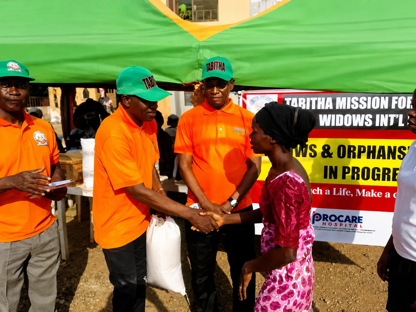TAMOW team greeting a beneficiary in partnership with Procare Hospital