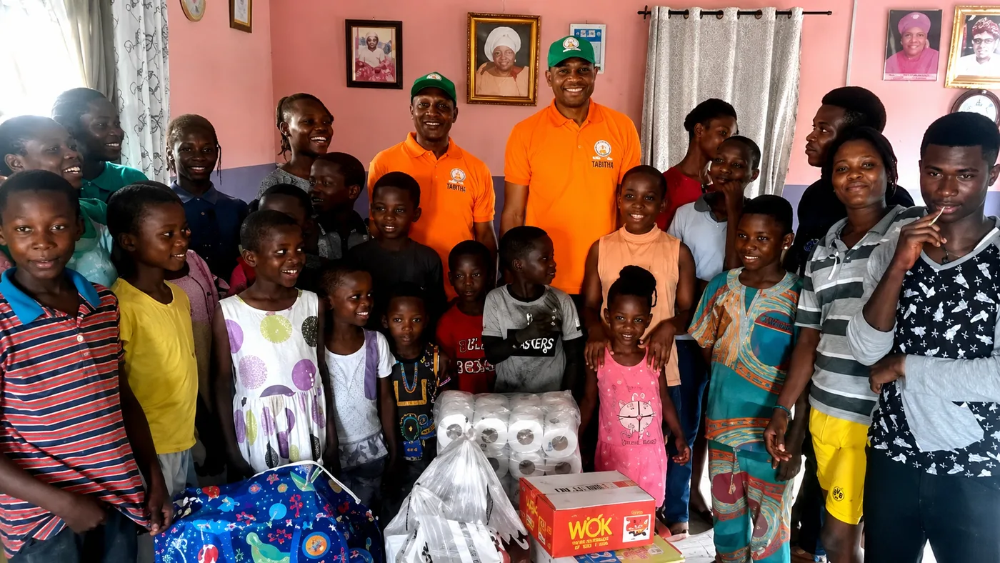TAMOW team with children at a children's home