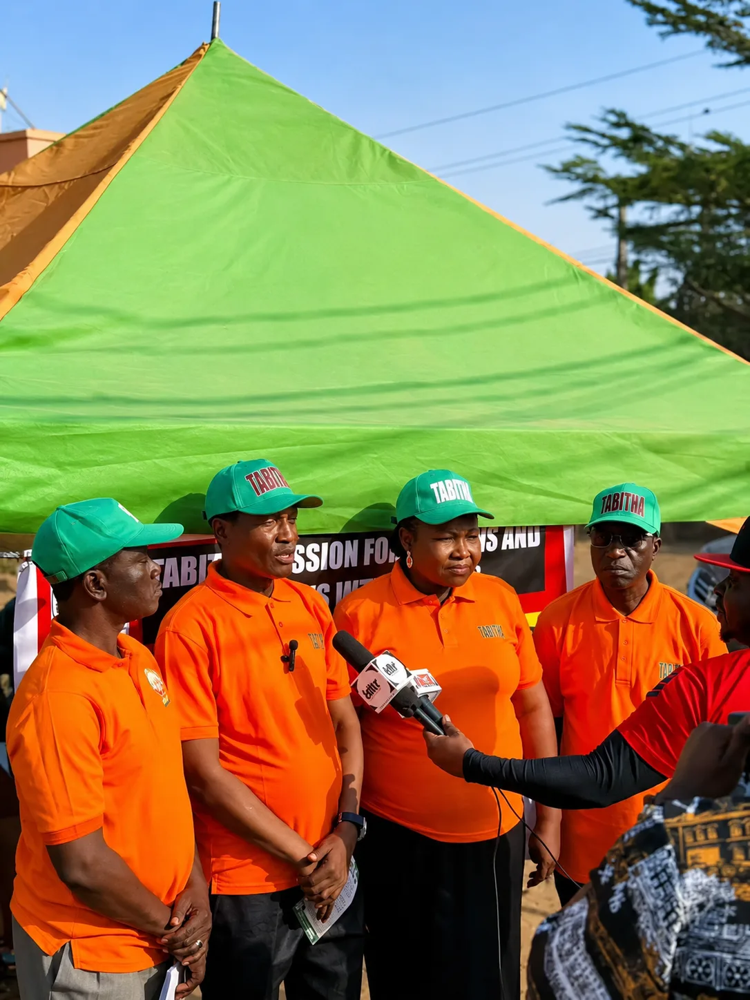 TAMOW leadership addressing the press at an outreach event
