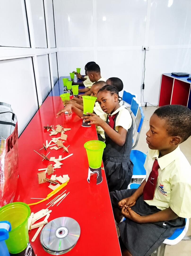 Children working on hands-on craft projects