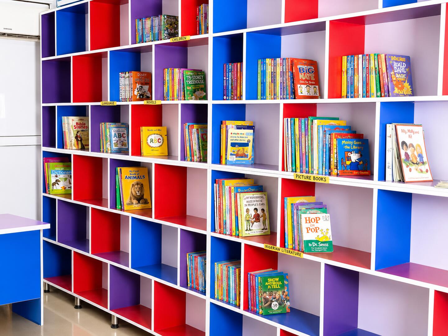Colourful library shelves at Rare Breeds Academy