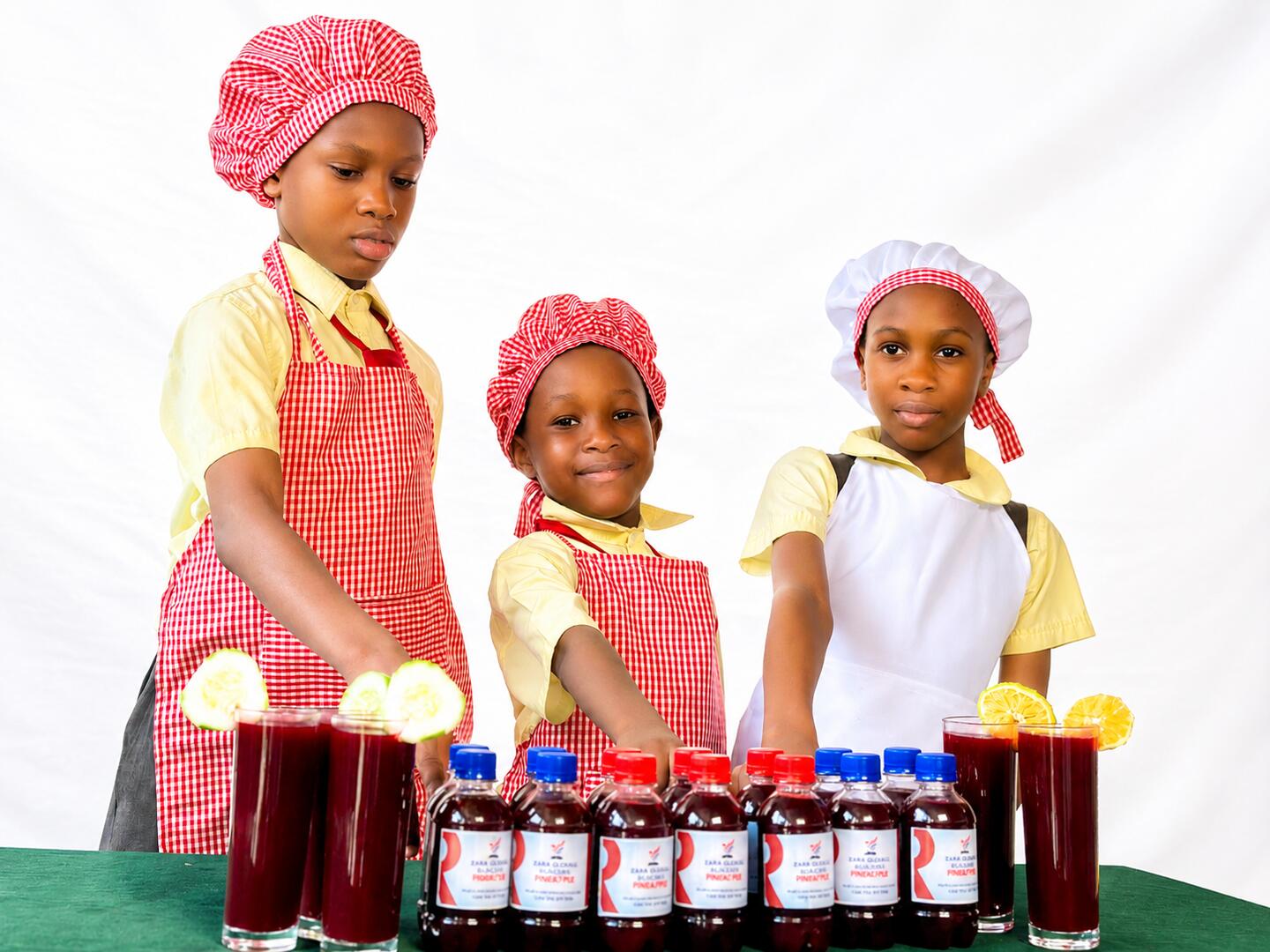 Pupils presenting drinks they prepared in class